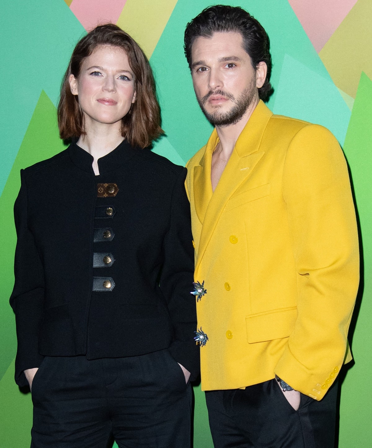 Kit Harington sported a bright yellow blazer with checkerboard-printed loafers, while Rose Leslie wore a black blazer with gold buttons and black pants and shoes