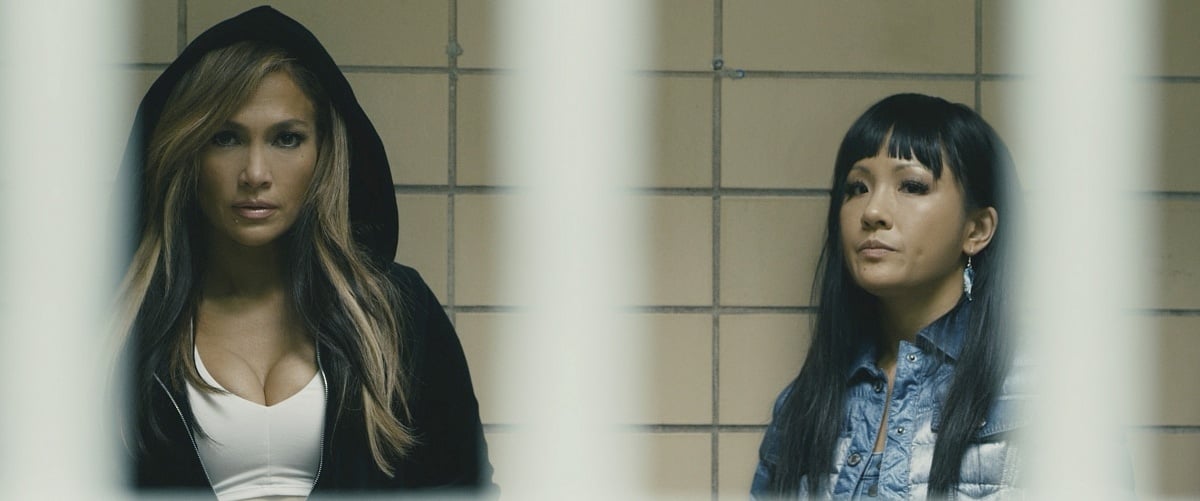 Jennifer Lopez as Ramona Vega and Constance Wu as Destiny in the 2019 crime comedy-drama film Hustlers