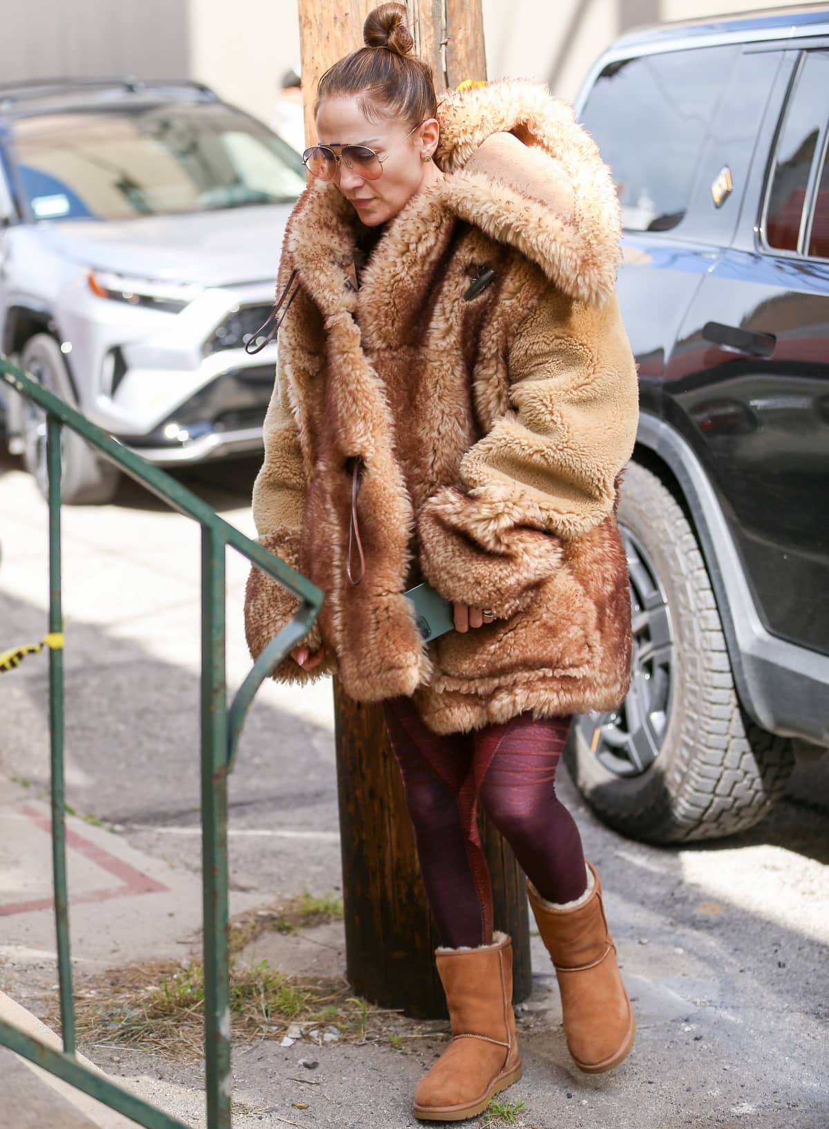 Jennifer Lopez keeping herself warm in a furry coat and Ugg boots while out and about in Los Angeles