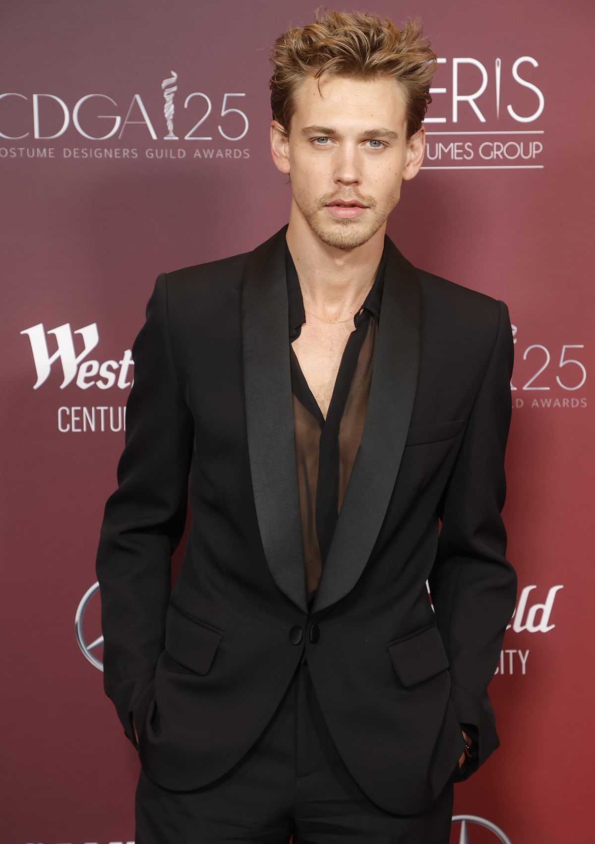 Austin Butler brings his agent James Farrell, instead of girlfriend Kaia Gerber, as his plus-one to the Vanity Fair Oscars Party