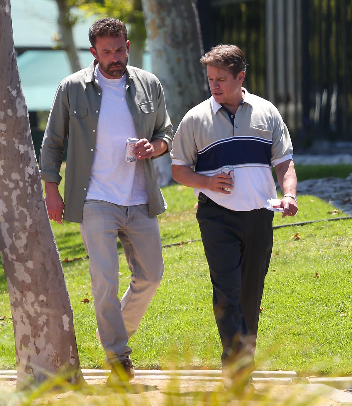 Ben Affleck and Matt Damon take a break on set while filming Air, showcasing their close collaboration both on and off screen