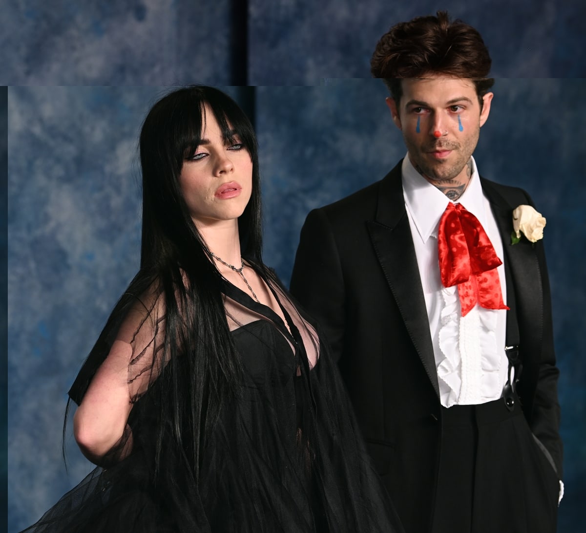 Billie Eilish was accompanied by her boyfriend Jesse Rutherford, who sported a black suit, a corsage, a quirky red necktie, and clown makeup