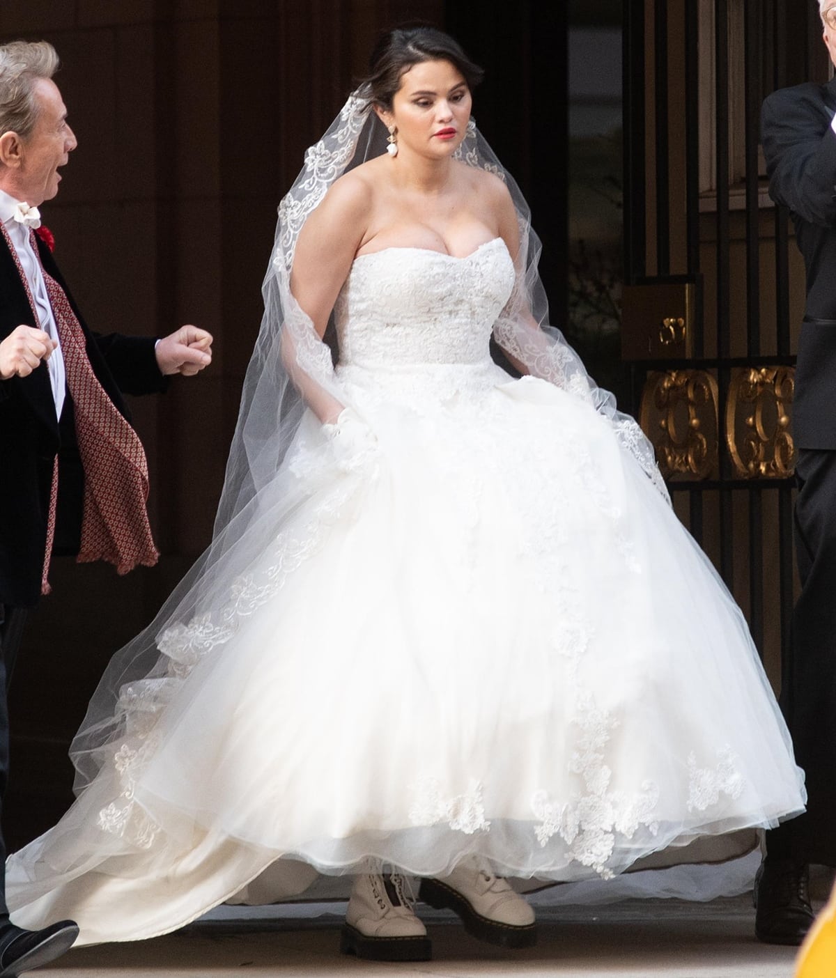 Selena Gomez paired her wedding dress with white Dr. Martens Jadon polished smooth leather boots featuring a chunky platform sole, air-cushioned for comfort and oil and fat resistant with good abrasion and slip resistance