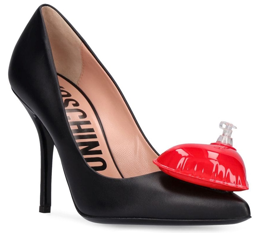 These Moschino pumps are made of leather and feature inflatable red heart detail, pointed toes, and 4-inch heels