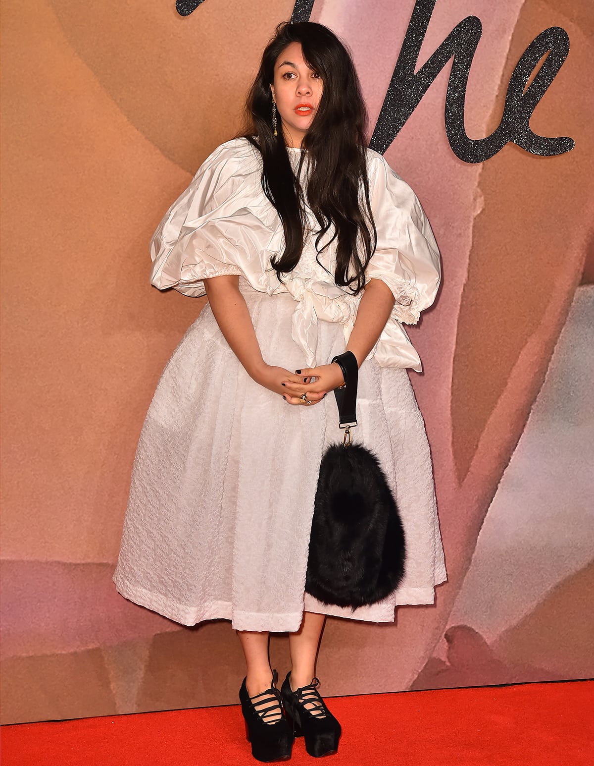 Simone Rocha got her start in fashion design by working at her father's studio and later studying at National College of Art and Design