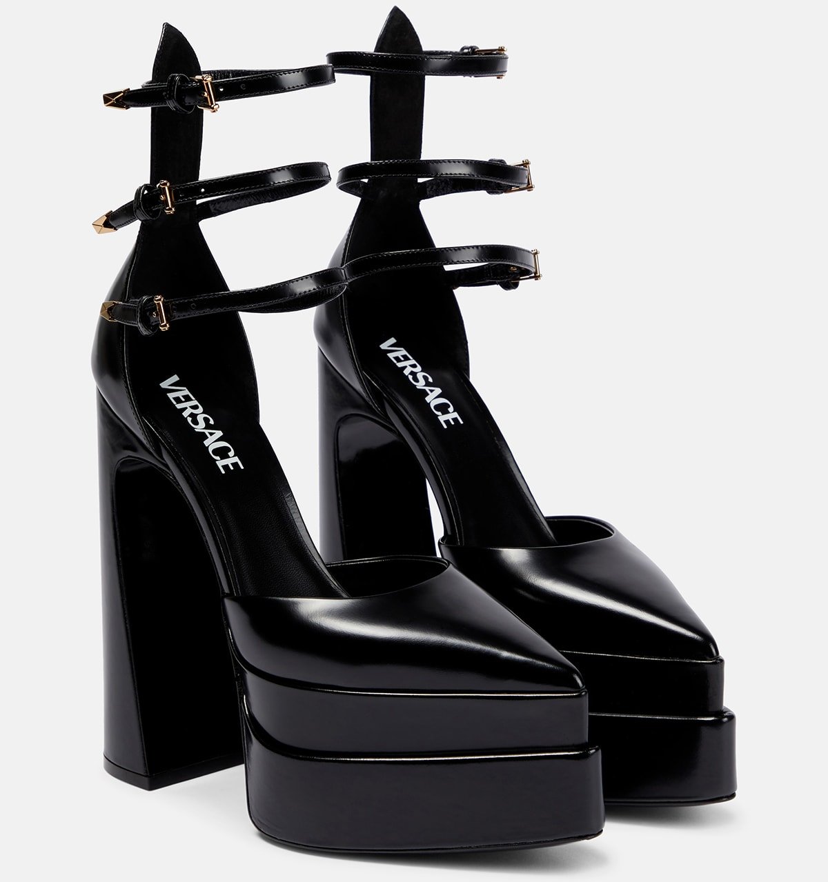 The Versace Aevitas Pointy Pumps have two-tiered pointed platforms, triple ankle straps, and high block heels