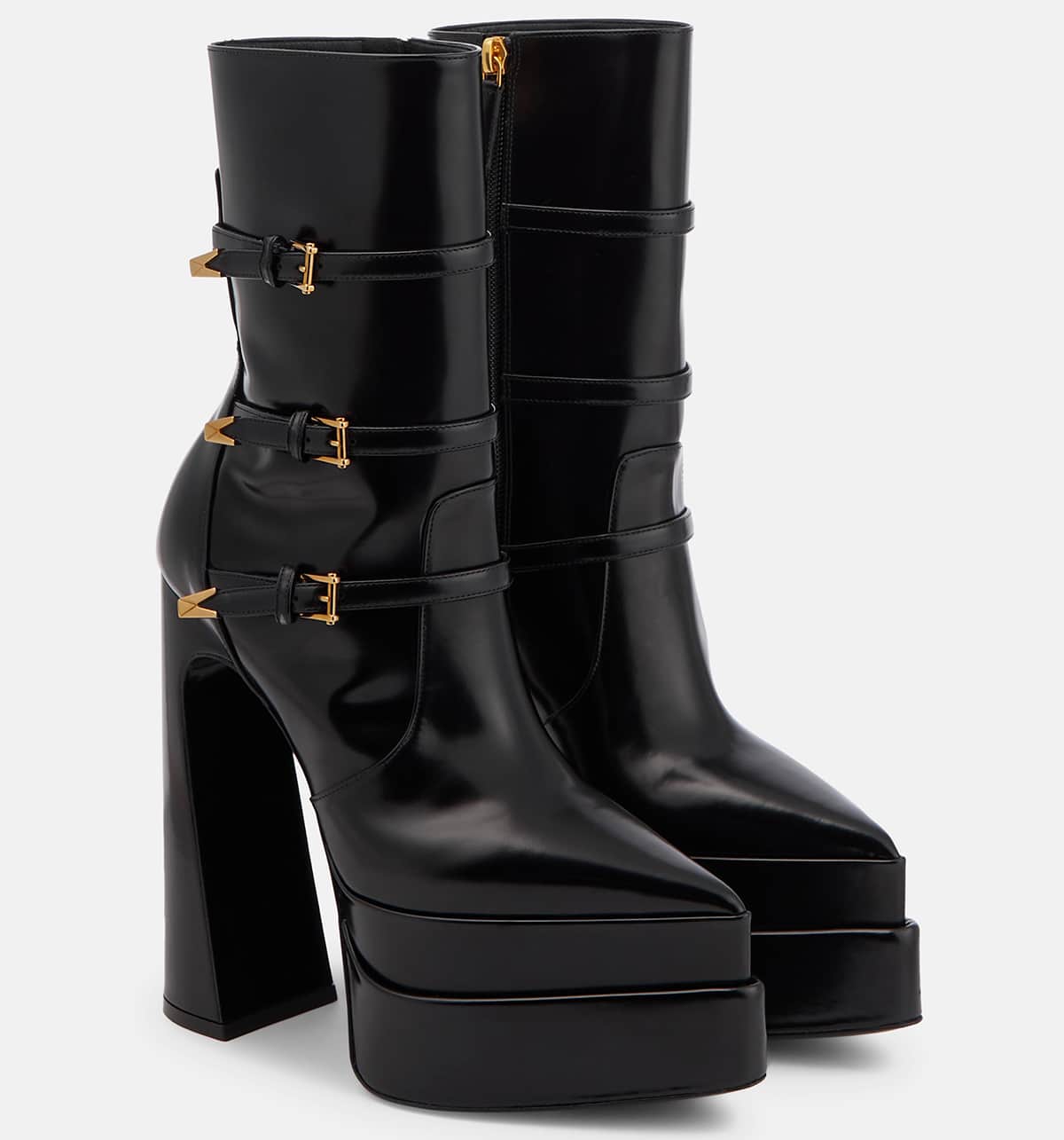 The Versace Aevitas Pointy Ankle Boots have triple buckled straps, double platforms, and slanted block heels