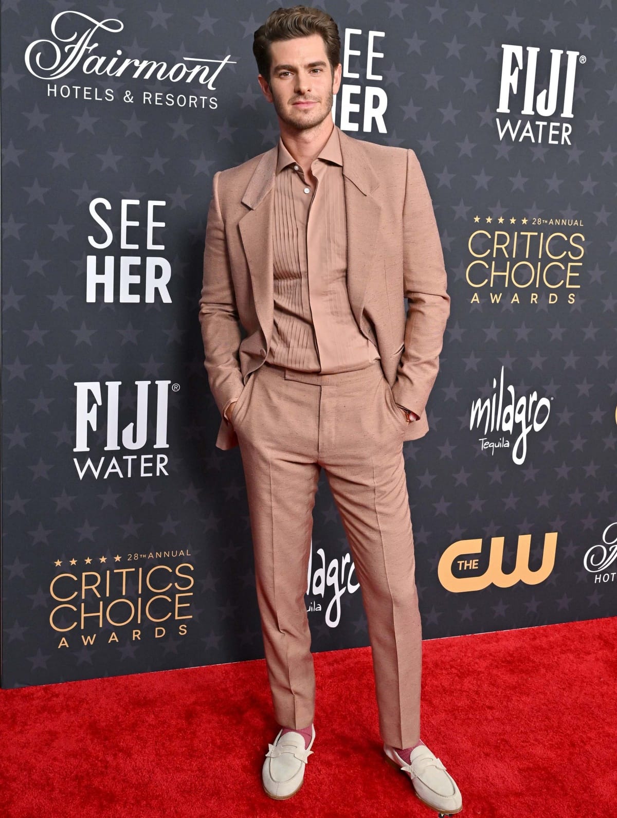 Andrew Garfield wore a tonal Zegna suit with Christian Louboutin No Penny suede loafers at the 28th Annual Critics Choice Awards