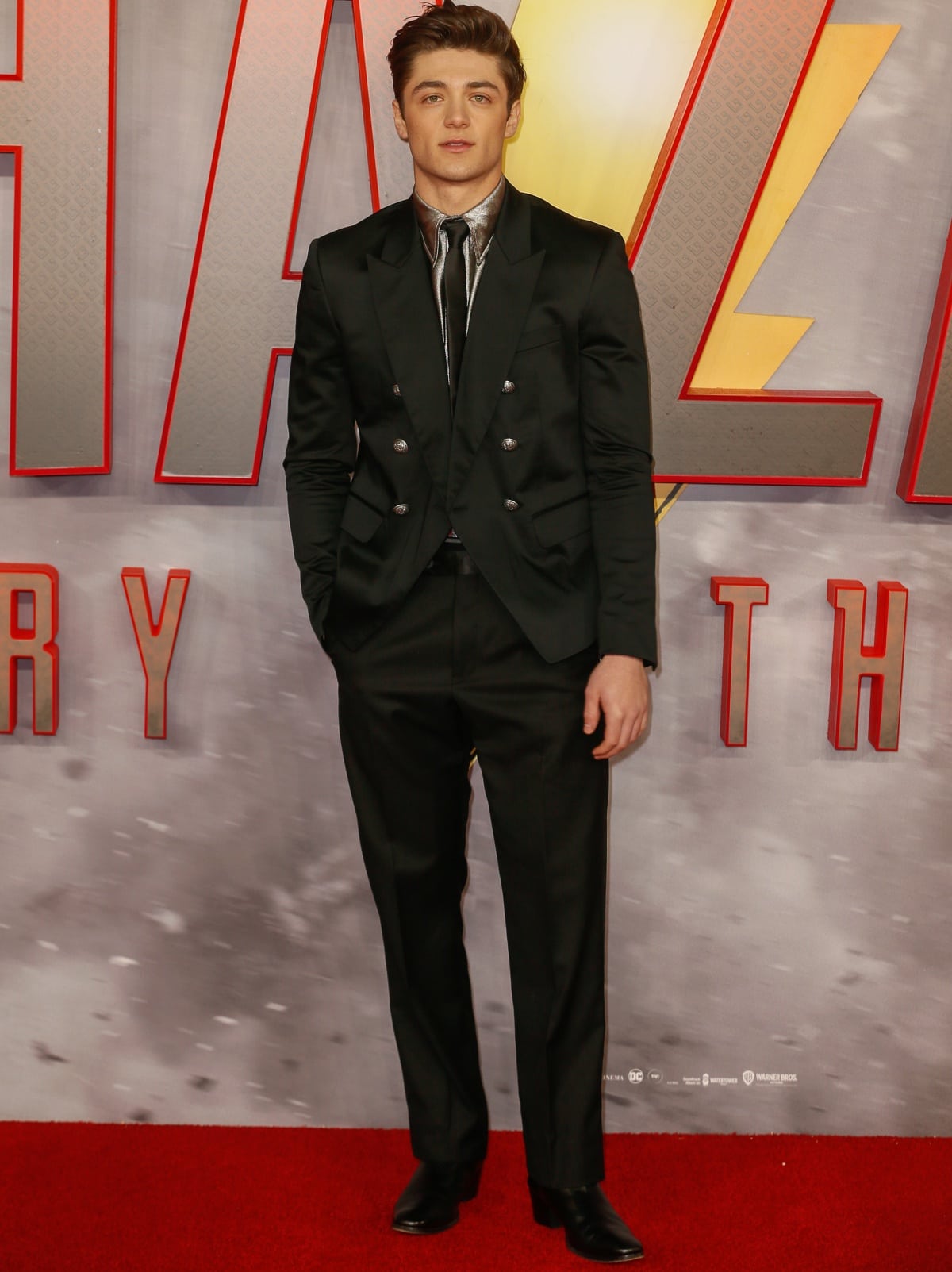 Asher Angel suited up for the UK premiere of Shazam! Fury of the Gods