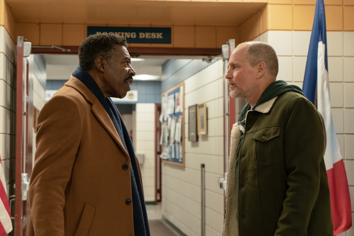 Woody Harrelson and Ernie Hudson face off in a tense moment from Champions, highlighting their characters' rivalry on and off the court