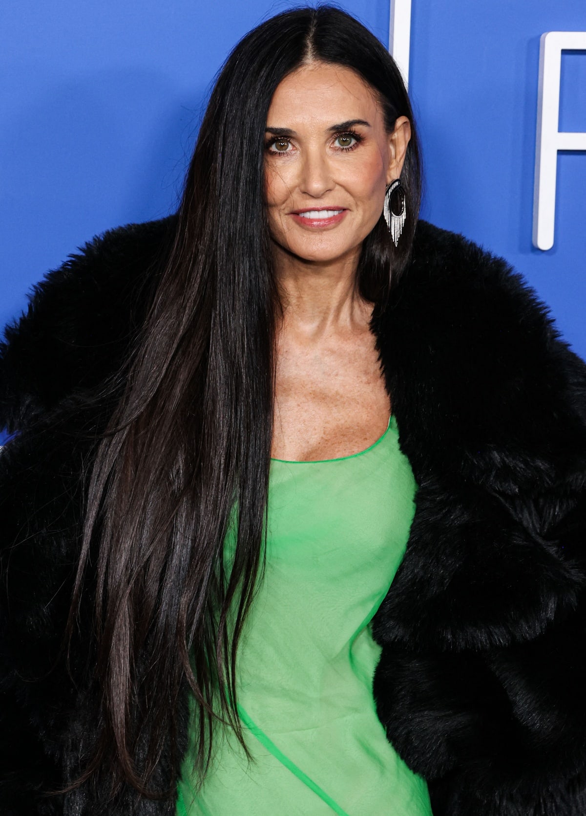 Demi Moore’s beauty look was understated, with rose-tinted lips and her signature long straight hair cascading down her back