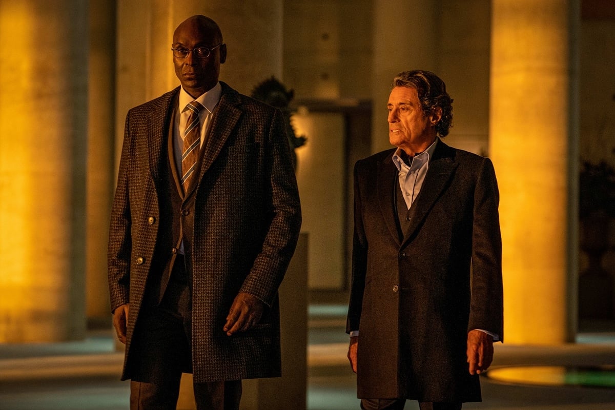 Lance Reddick as Charon and Ian McShane as Winston in the 2023 neo-noir action thriller film John Wick: Chapter 4