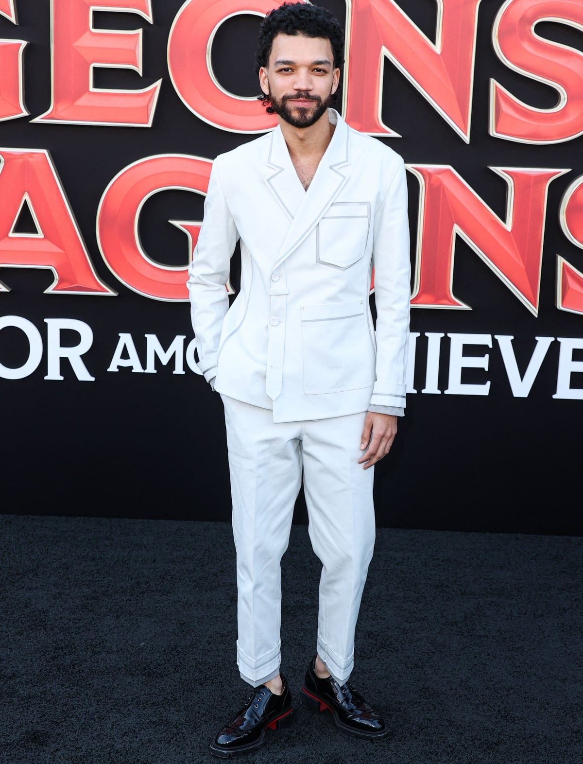 Justice Smith opted for monochromatic fashion at the Los Angeles premiere of Dungeons & Dragons: Honor Among Thieves