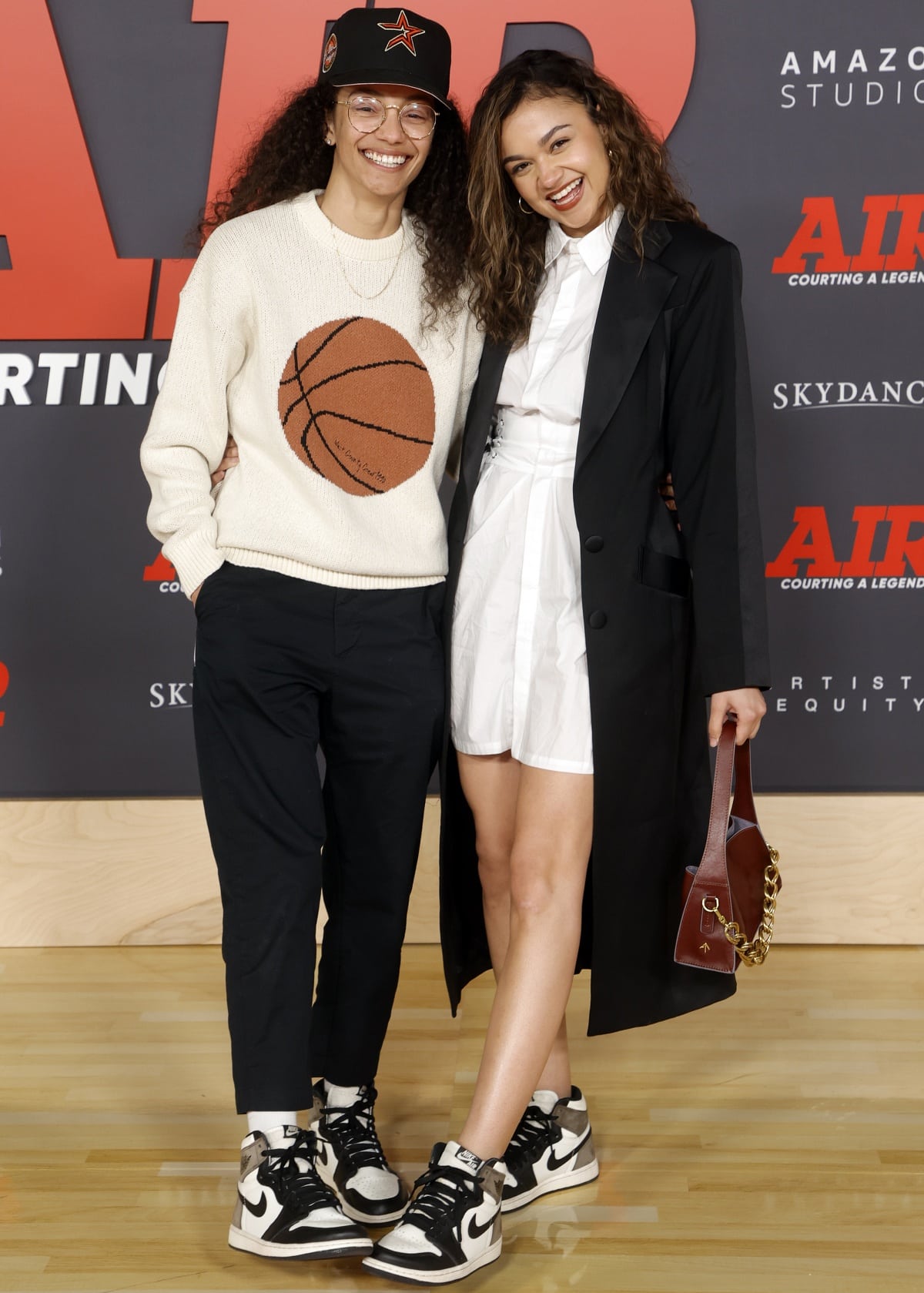 Mariah Linney and Madison Bailey looked every bit the happy couple at the premiere of AIR