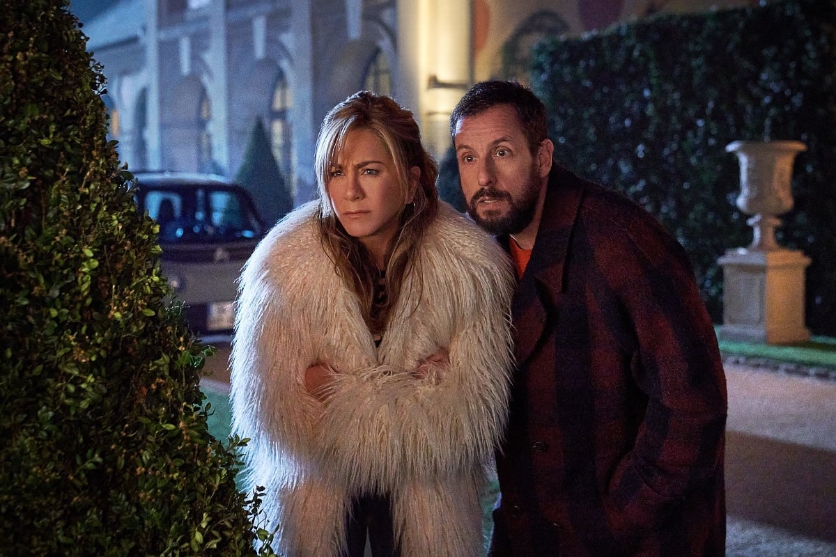 Jennifer Aniston as Audrey Spitz and Adam Sandler as Nick Spitz in the action-comedy film Murder Mystery 2
