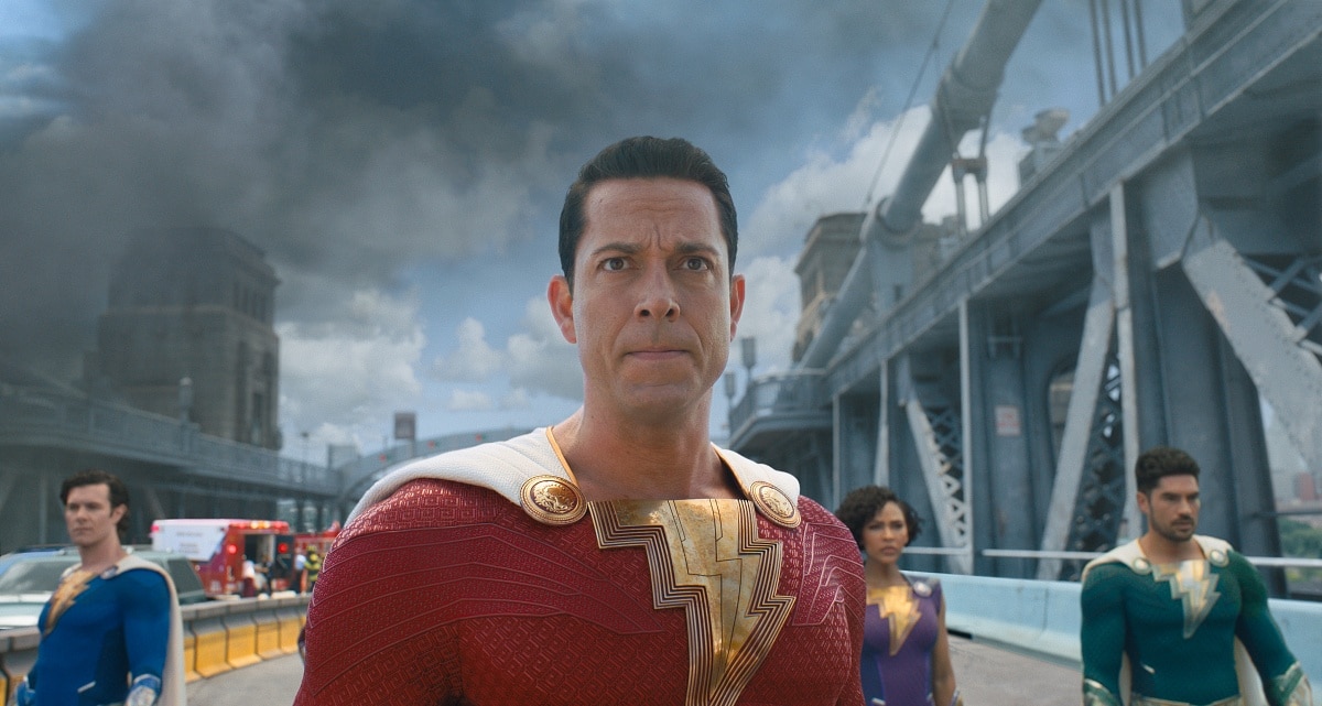 Shazam, played by Zachary Levi, stands ready for battle with his superhero team by his side, as the city faces a looming threat