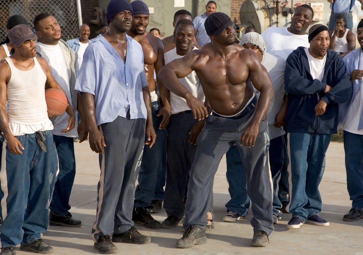 Nelly as Earl Megget, Michael Irvin as Deacon Moss, and Terry Crews as Cheeseburger Eddy in the 2005 sports comedy film The Longest Yard