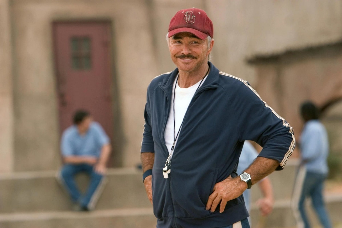 Burt Reynolds as Coach Nate Scarborough in the 2005 sports comedy film The Longest Yard