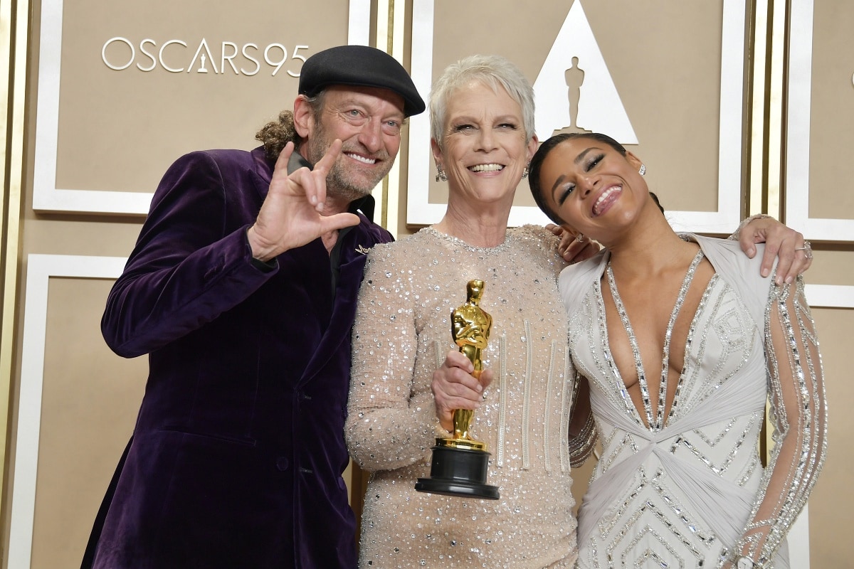 Jamie Lee Curtis with presenters Troy Kotsur and Ariana DeBose at the 95th Annual Academy Awards press room after winning Best Supporting Actress for her work in Everything Everywhere All at Once