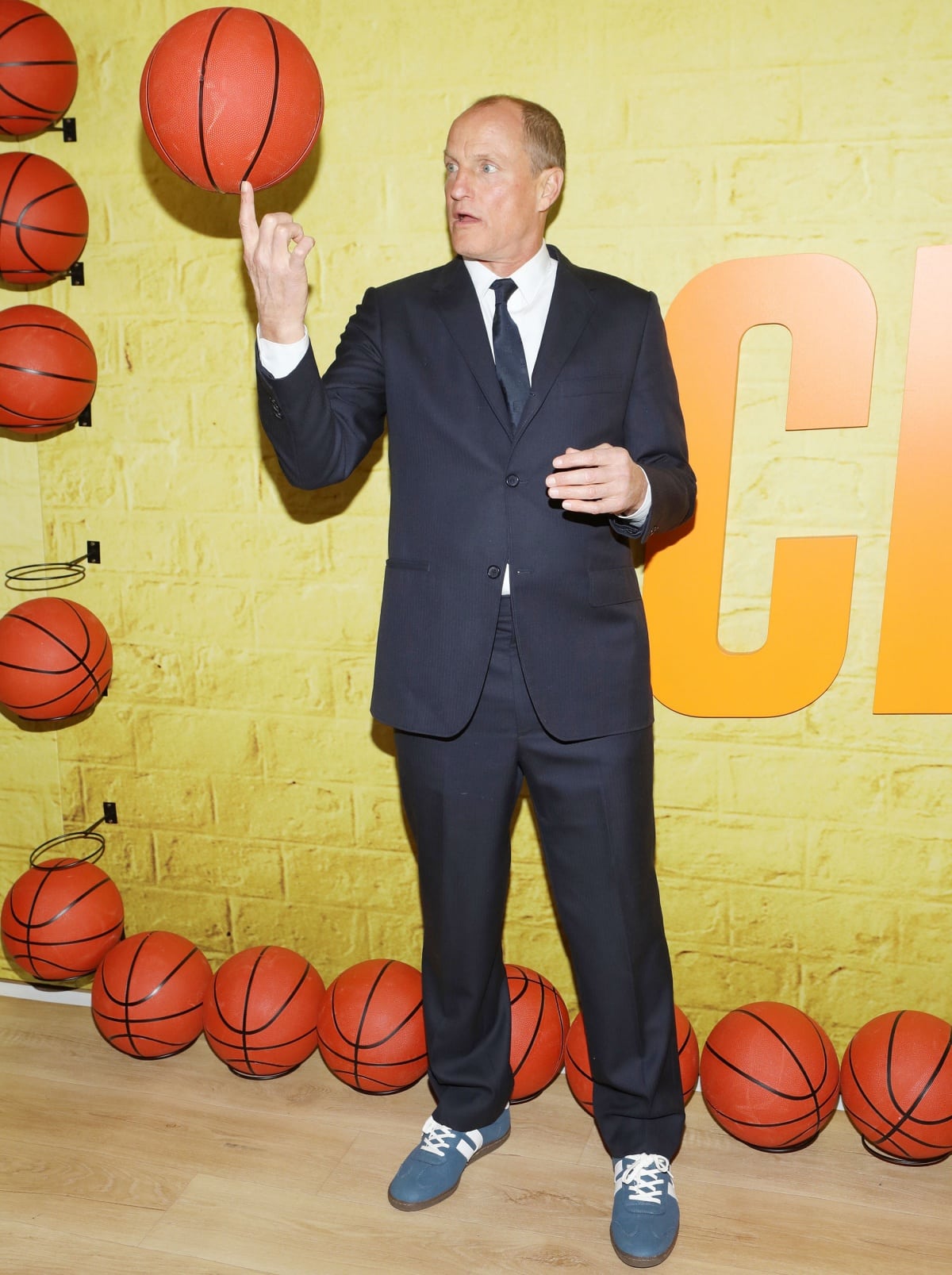 Woody Harrelson showing off his basketball skills at the premiere of Champions