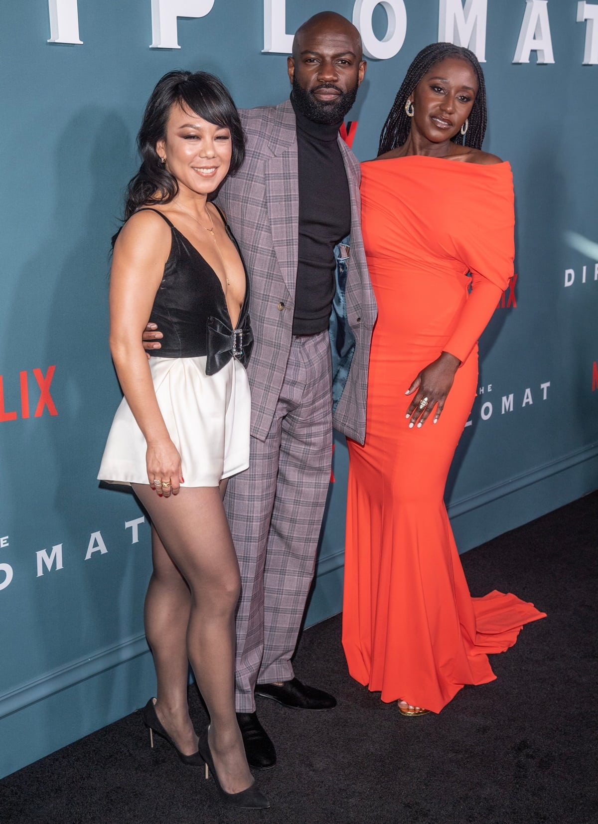 Posing with Ali Ahn and Nana Mensah, David Gyasi is a British actor, standing at 5 feet 9.75 inches (177.2 cm) tall, who is best known for his roles in Interstellar, Cloud Atlas, Shooting Dogs, and the TV show White Heat
