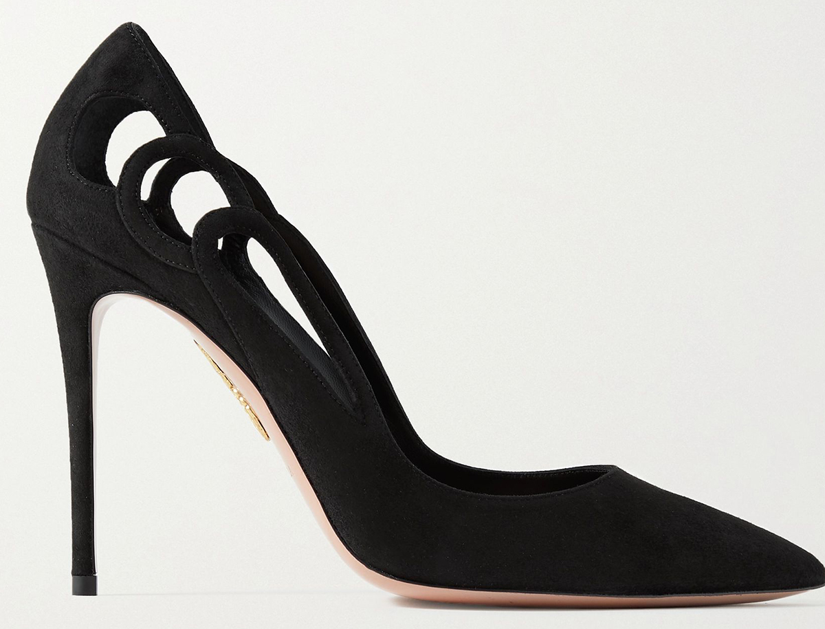 The Fenix pumps by Aquazzura feature art deco cutouts along the sides, pointed toes, and stiletto heels