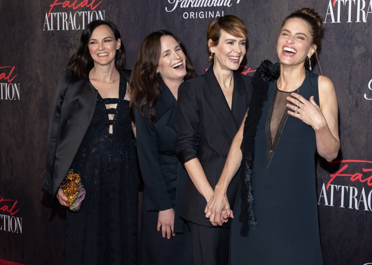 Amanda Peet, Sarah Paulson, Elizabeth Reaser, and Carla Gallo share a laugh while looking effortlessly chic in coordinated black outfits at the Fatal Attraction premiere