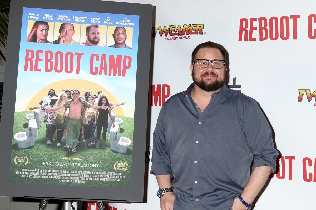Chaz Bono portrays the character Herbert in the satirical American comedy film "Reboot Camp," which follows a group of individuals attending an unconventional self-help retreat in the desert