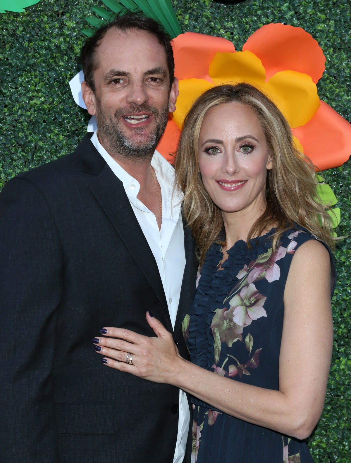 Manu Boyer, a French filmmaker and producer, met his wife Kim Raver met at a pool in 1999 and married a year later