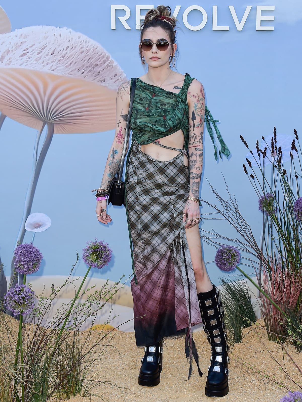 Paris Jackson showcased a grunge-inspired look in black Steve Madden combat boots with thick platform soles at the 2023 REVOLVE Festival