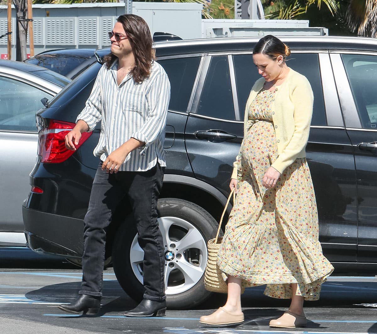 Derek Richard Thomas and pregnant Rumer Willis running errands in West Hollywood on April 10, 2023