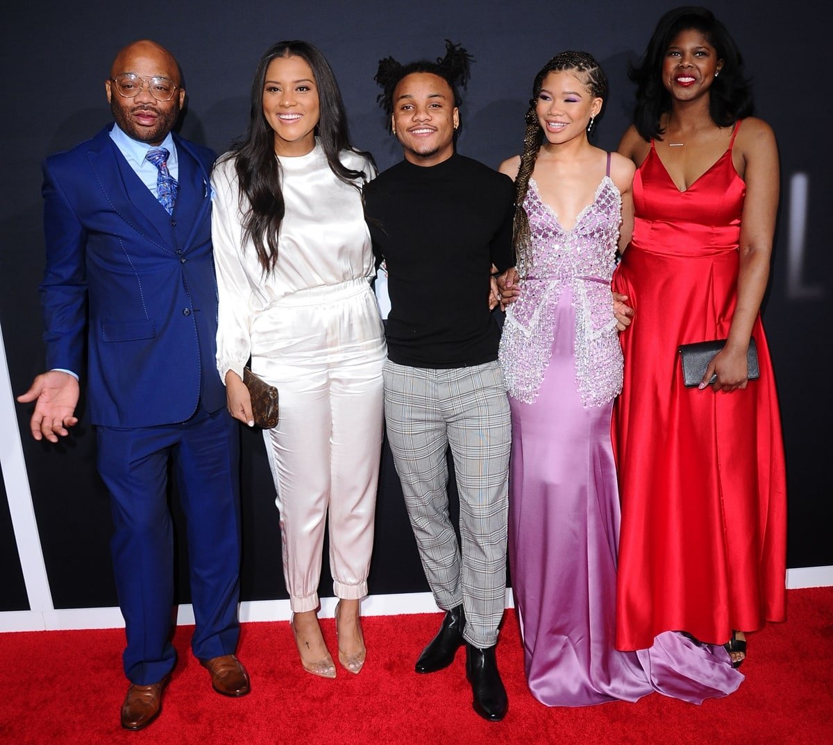 Storm Reid posing with her father, Rodney Reid, her elder brother Josh, and her two elder sisters, Iman and Paris