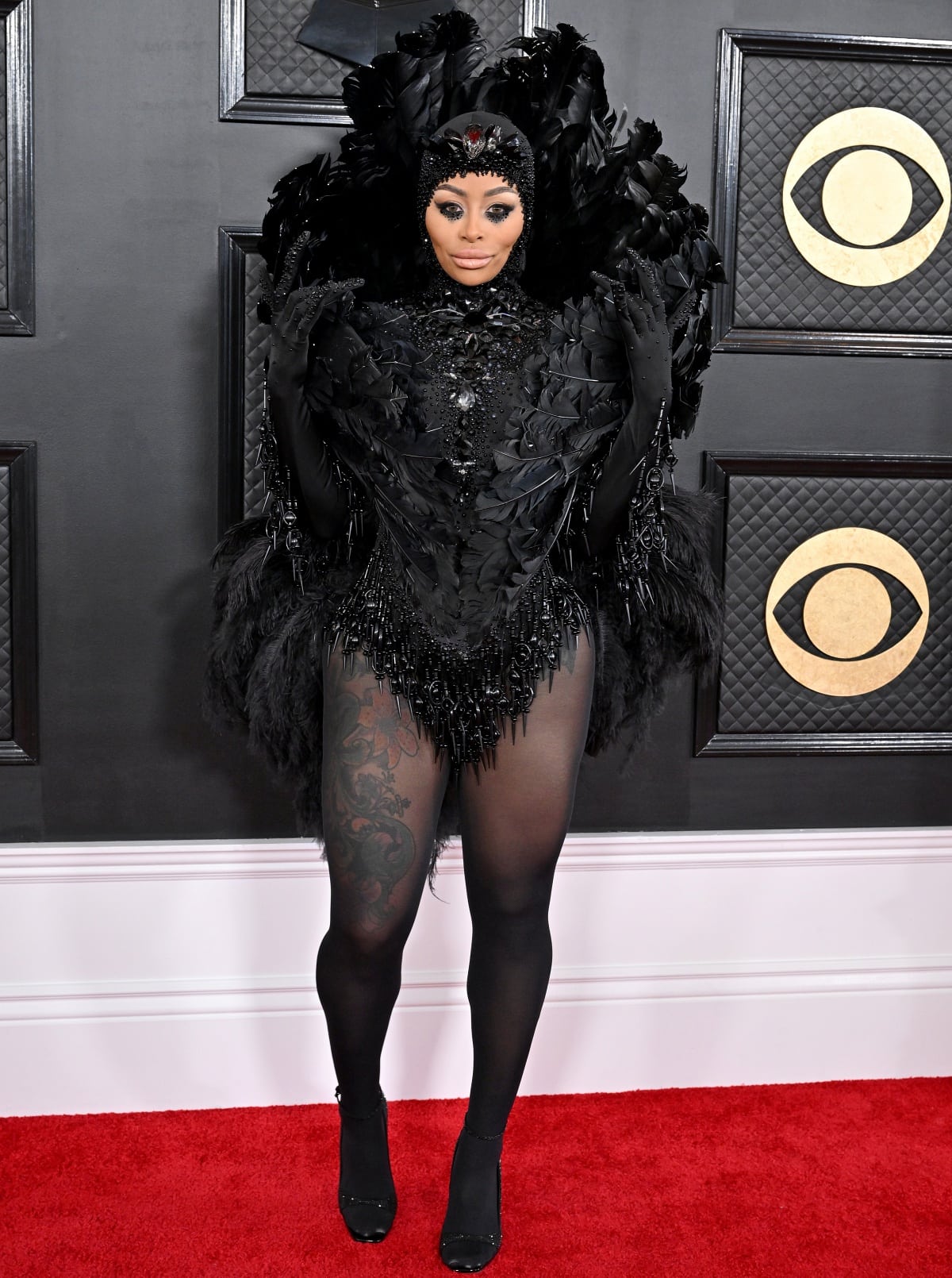 Blac Chyna in a black feathery ensemble at the 65th Annual Grammy Awards