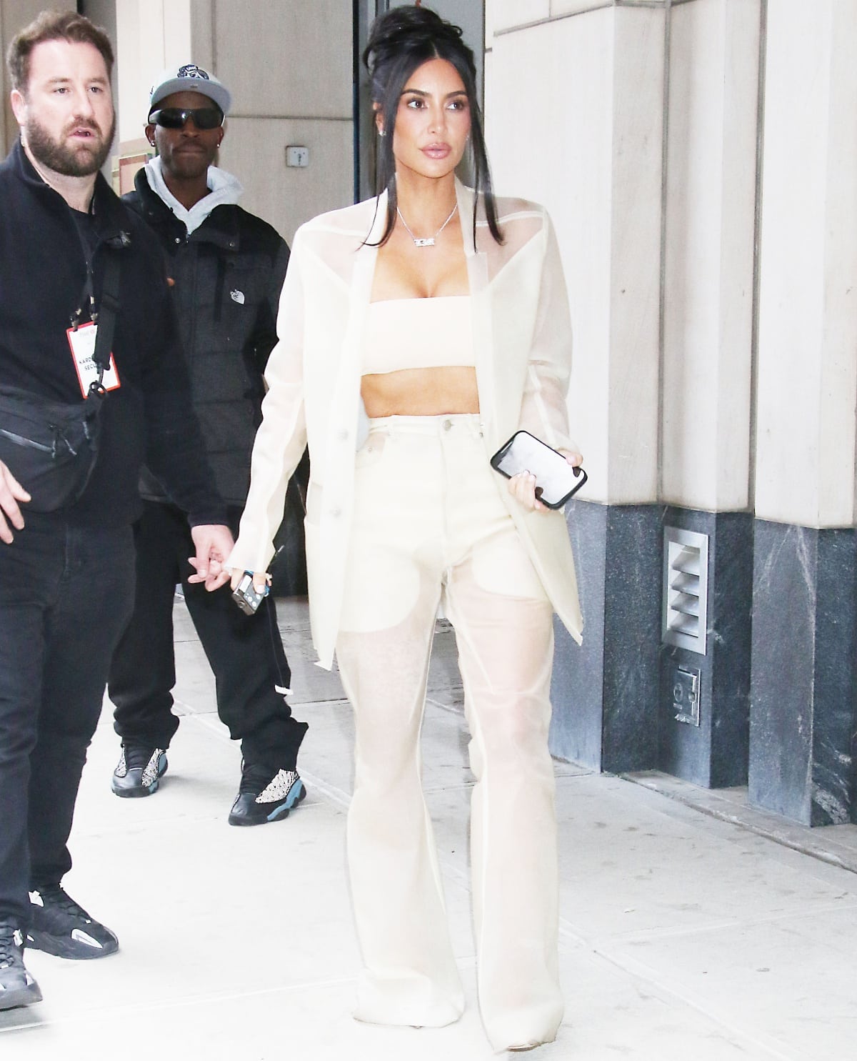 Kim Kardashian making an entrance in a Rick Owens transparent pantsuit at the Time100 Summit