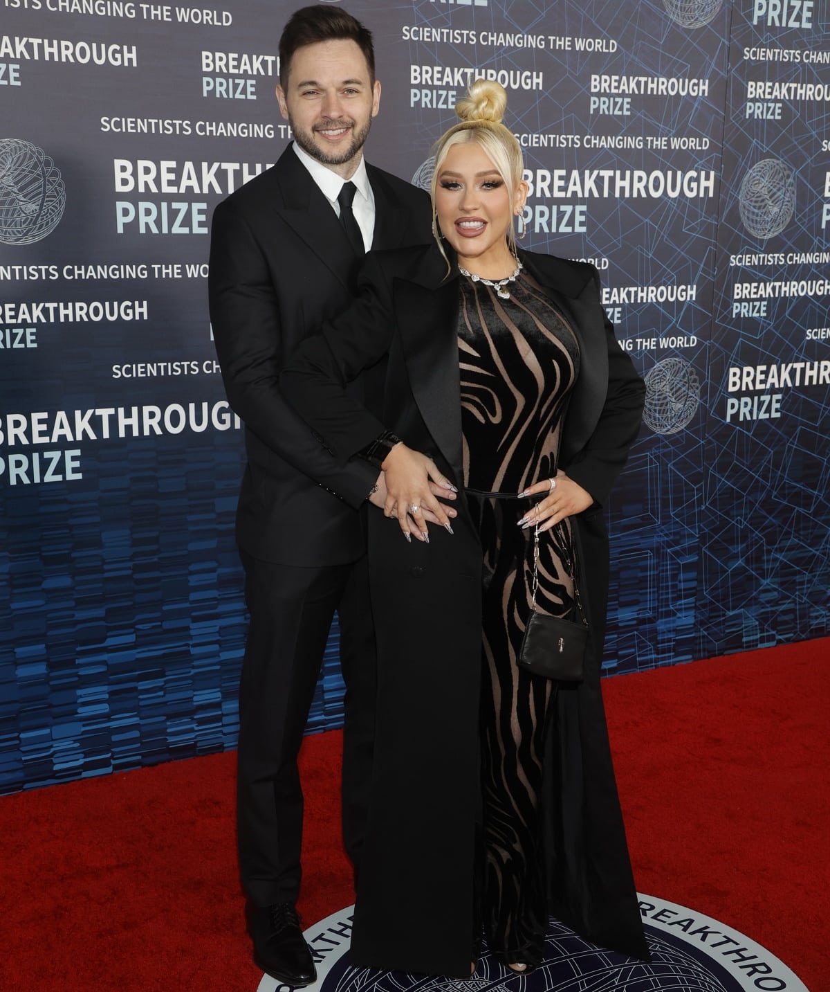Matthew Rutler and Christina Aguilera cozied up to each other at the 9th Annual Breakthrough Prize Ceremony