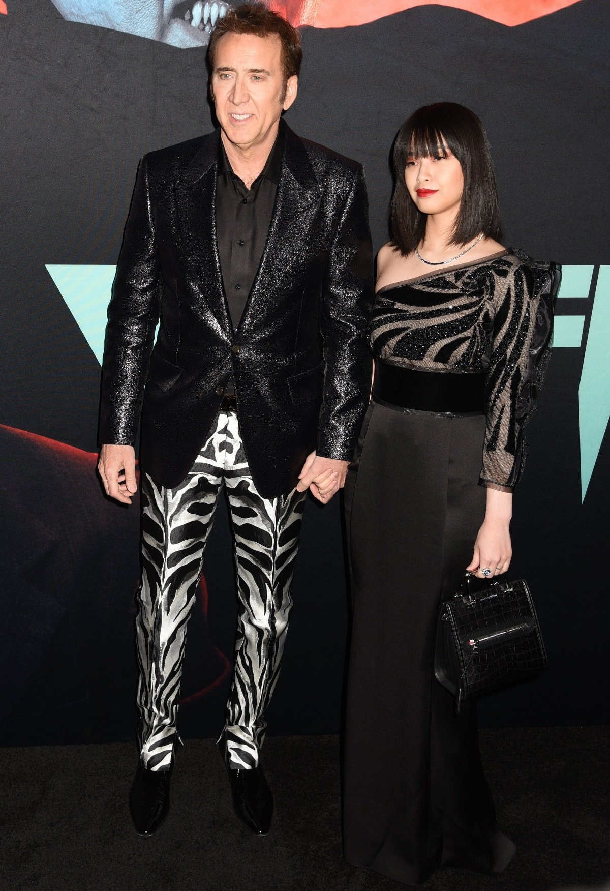 Nicolas Cage with his wife Riko Shibata at the premiere of Renfield in New York City