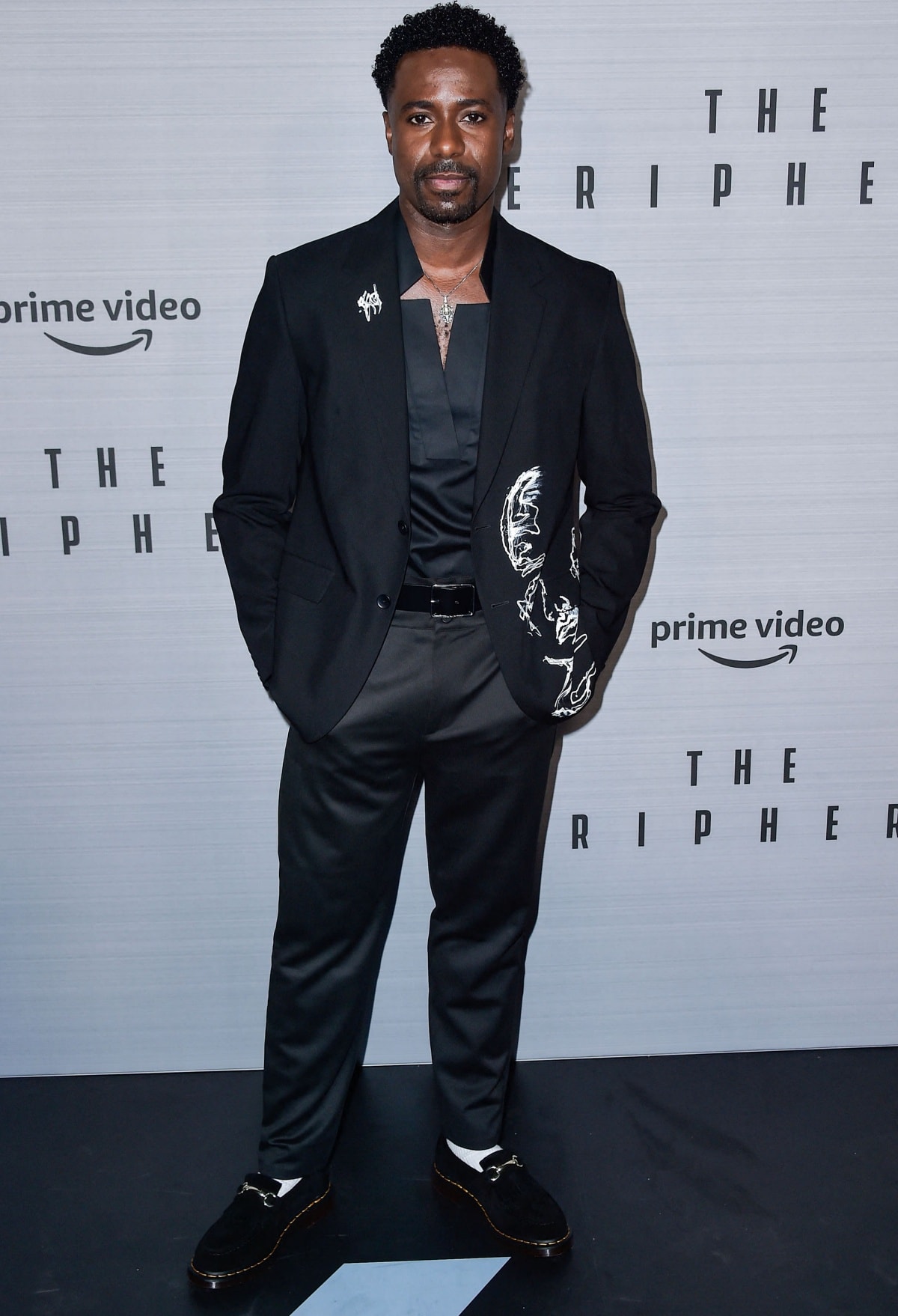 Gary Carr exudes sophistication in a black suit with artistic embroidery detailing at The Peripheral premiere