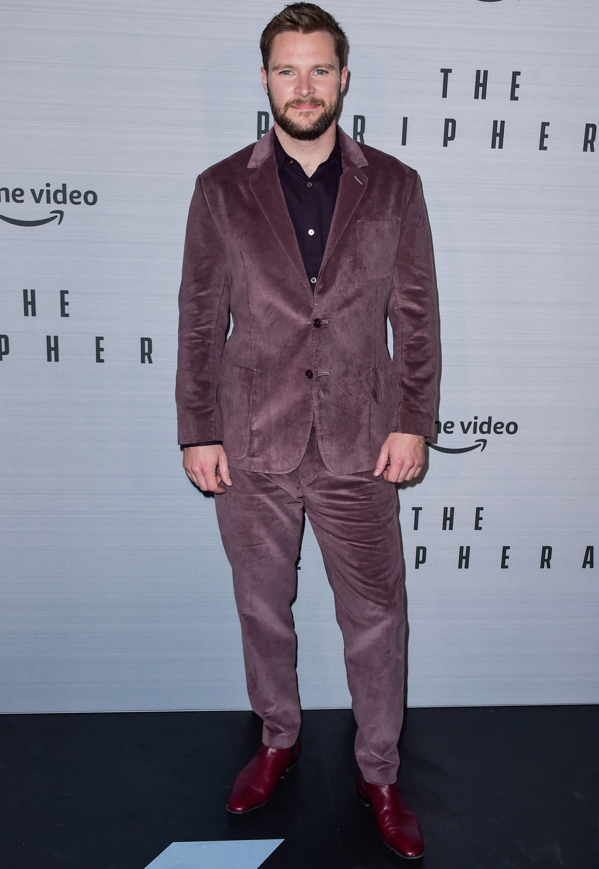 Jack Reynor stands out in a bold mauve corduroy suit paired with deep red boots at The Peripheral premiere