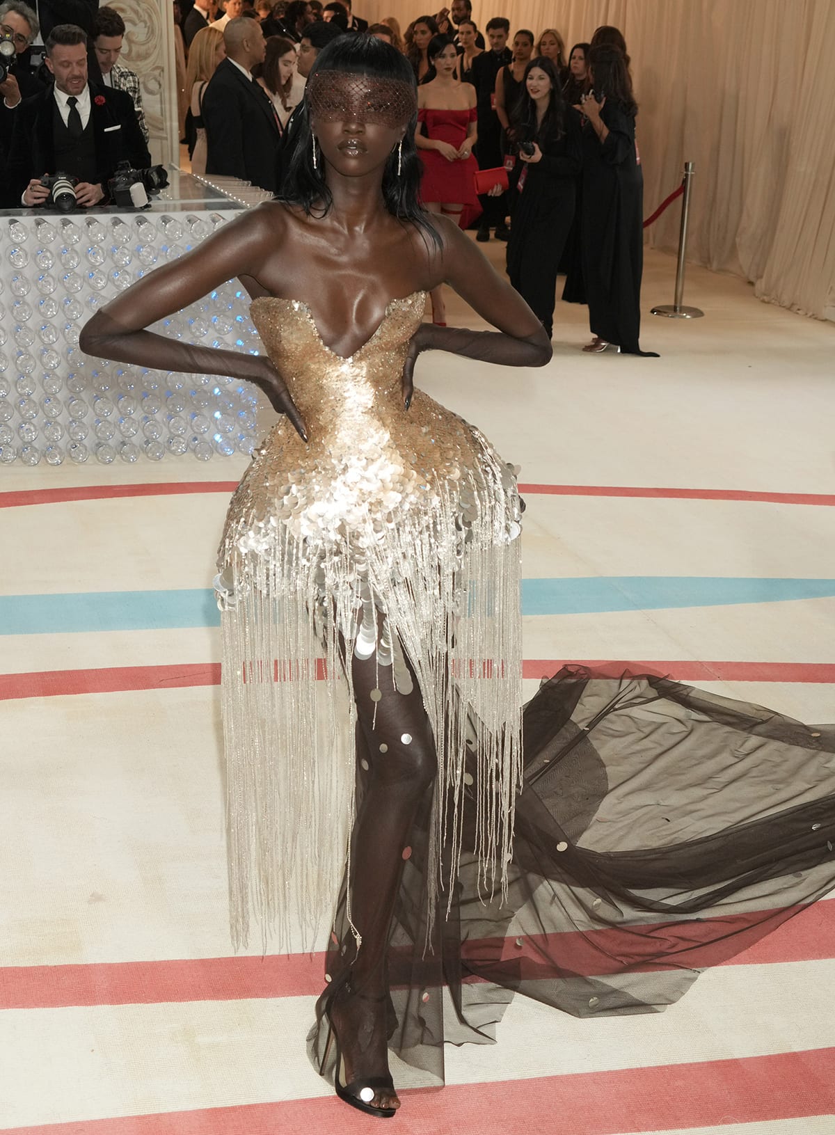 Anok Yai's Prabal Gurung Met Gala dress resembles a jellyfish with bugle bead fringes dripping from the structured pannier skirt