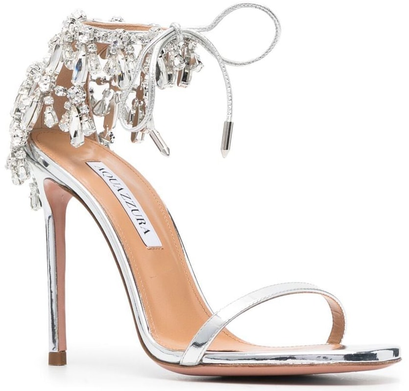 The Aquazzura Moonwalk sandals are defined by the crystals dangling around the tie-fastening ankle straps