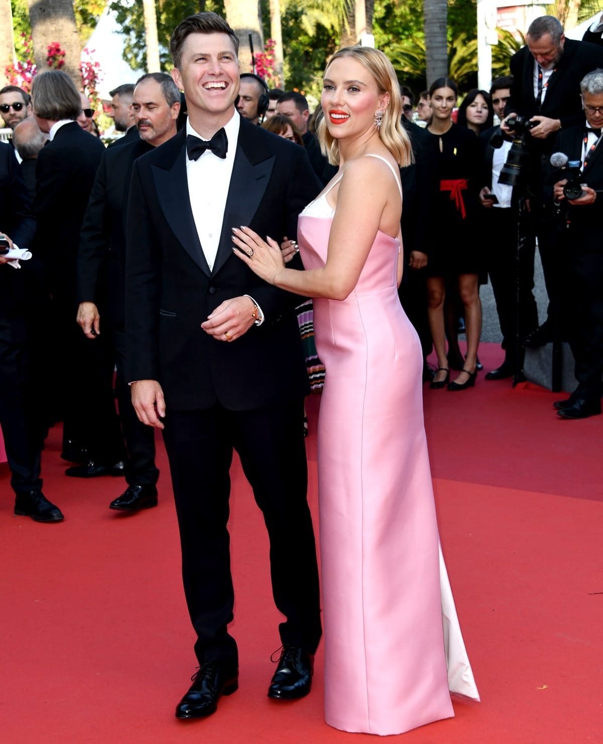 Colin Jost and Scarlett Johansson made a dazzling impression on the "Asteroid City" red carpet during the 76th annual Cannes film festival