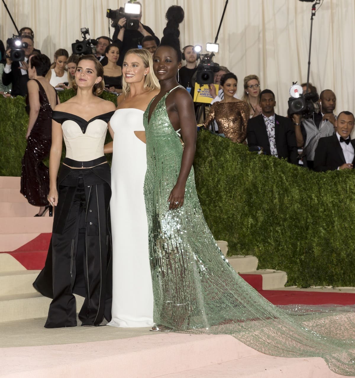 Emma Watson wore a custom Calvin Klein Collection gown made from recycled plastic bottles, Margot Robbie wore a white Calvin Klein Collection dress with metallic details, and Lupita Nyong'o wore a green sequined Calvin Klein Collection dress adorned with colorful jewels and beads at the Manus x Machina: Fashion in an Age of Technology Costume Institute Gala