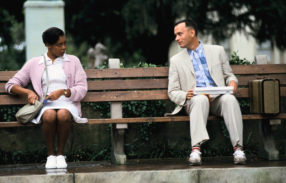 Rebecca Williams as a nurse on a park benk and Tom Hanks as Forrest Gump in the 1994 American epic comedy-drama film Forrest Gump