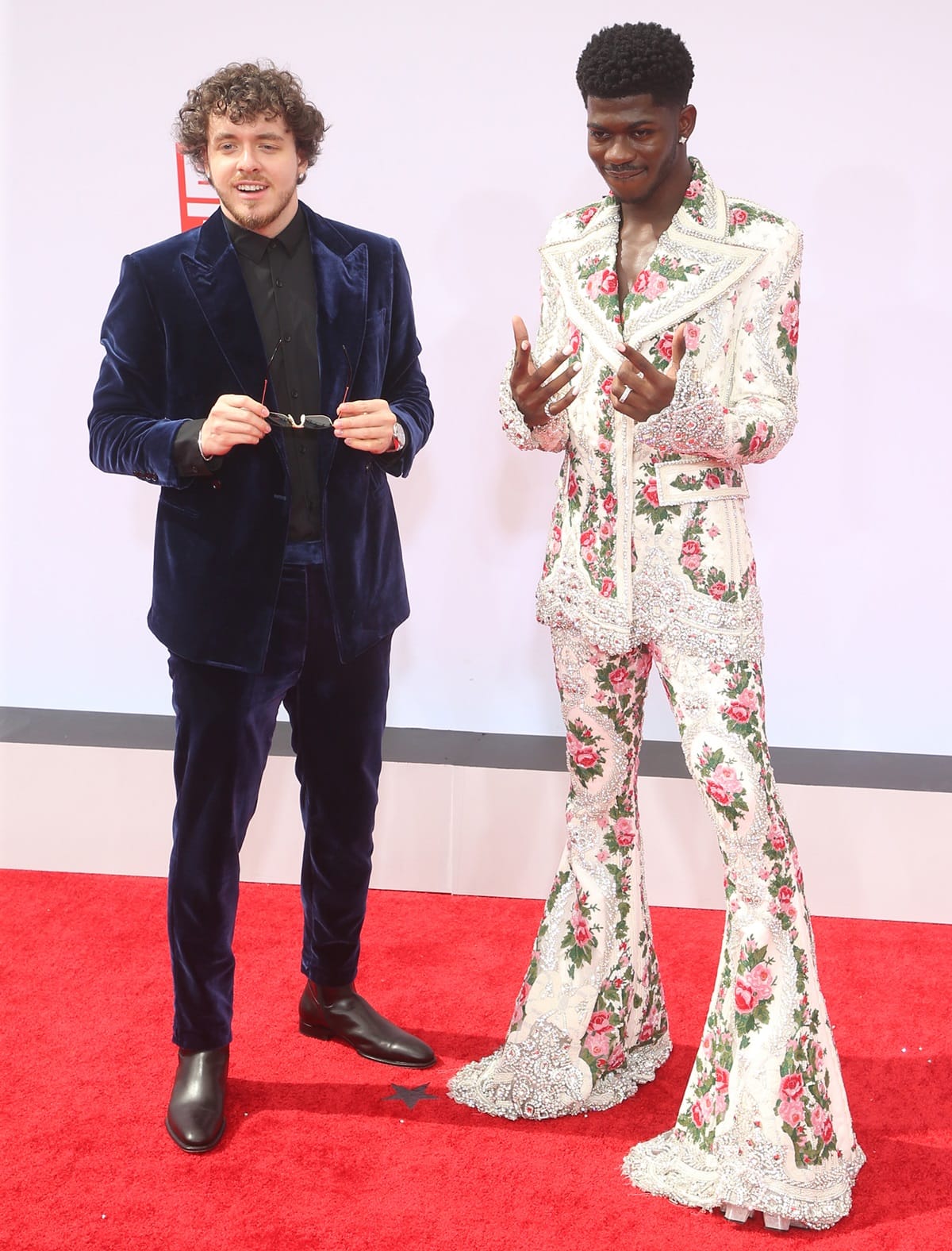 Jack Harlow is slightly taller than Lil Nas X by approximately 0.75 inches (1.9 cm), with Jack Harlow's height being 6ft 2 ¼ (188.6 cm) and Lil Nas X's height being 6ft 1 ½ (186.7 cm)