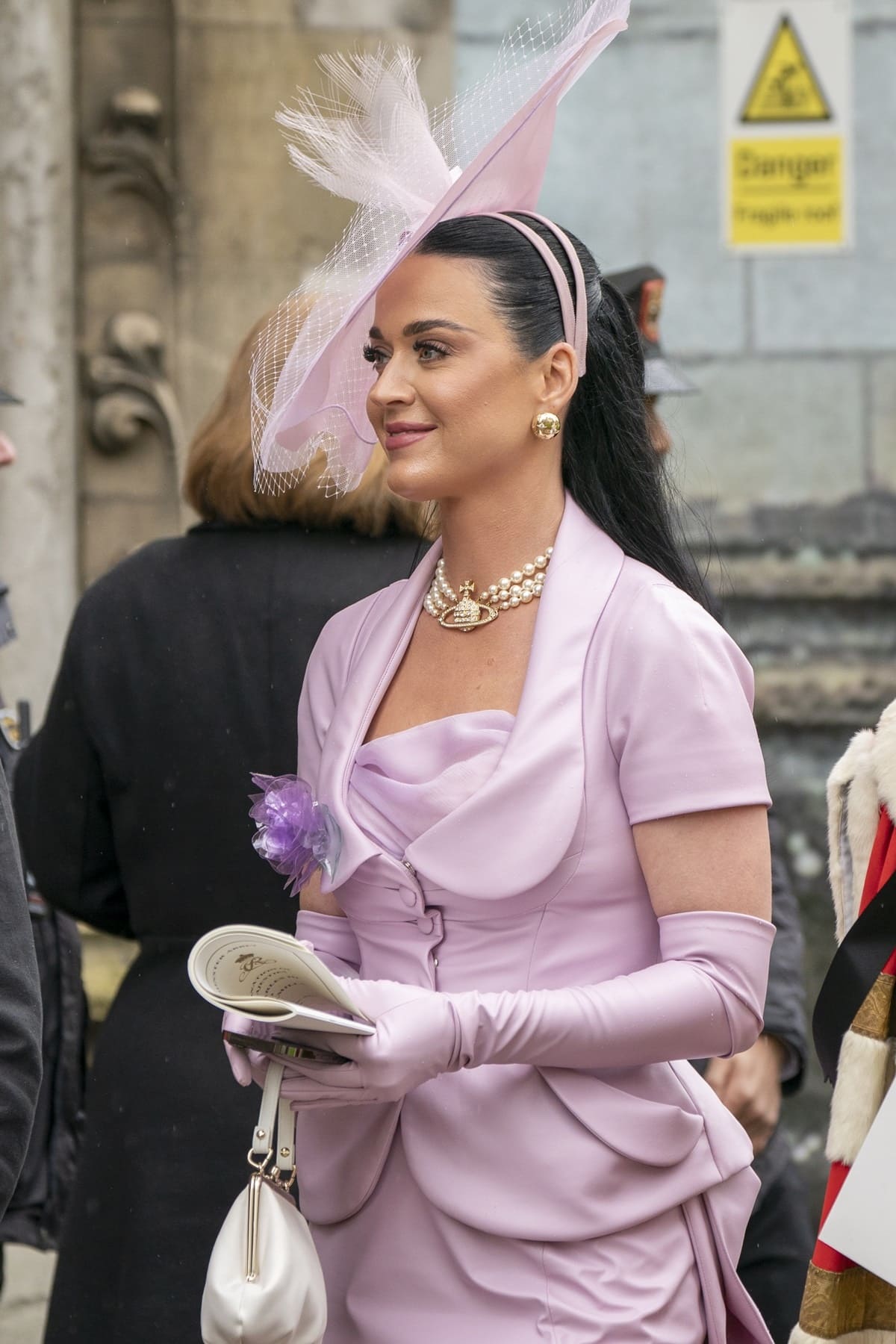 Katy Perry was dressed in a lovely lilac ensemble designed by Vivienne Westwood, along with a matching hat and gloves