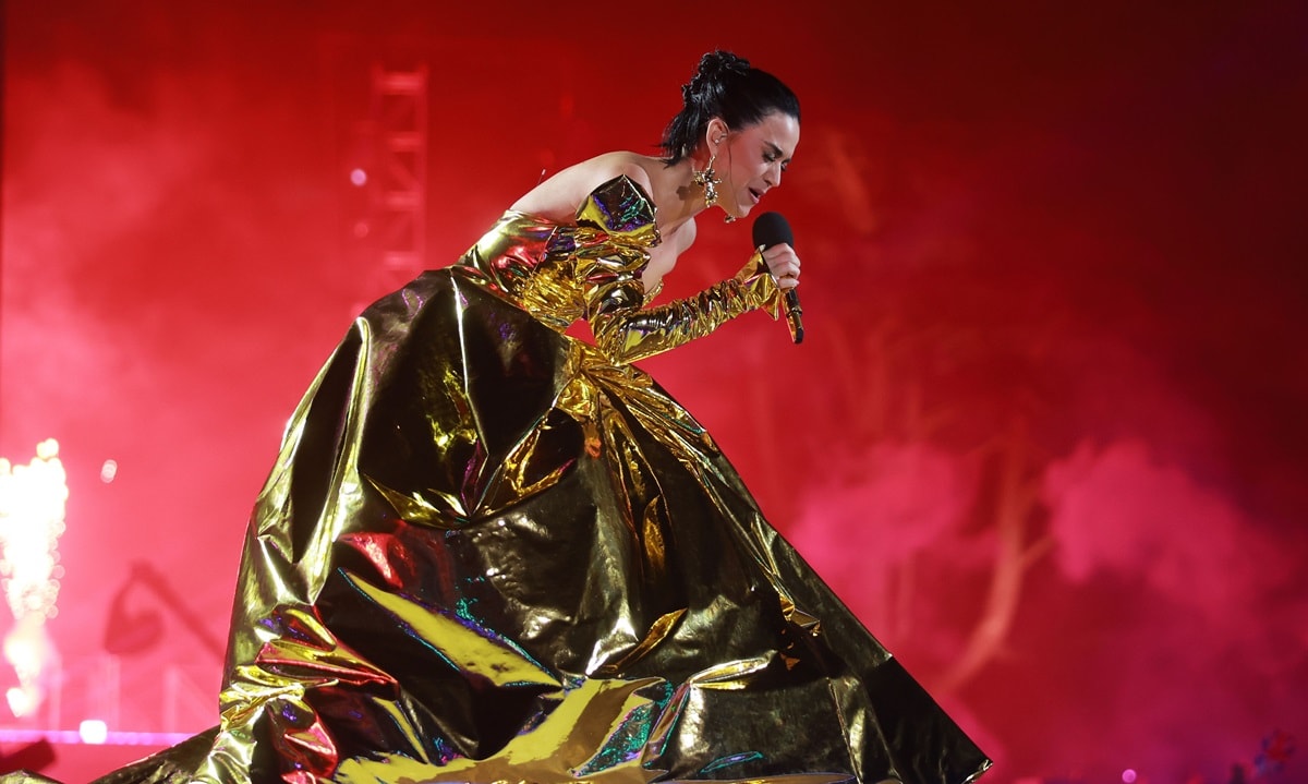Katy Perry performed two of her chart-topping hits, "Roar" and "Firework," the latter dedicated to the philanthropic work that she does with King Charles on the British Asian Trust, a charity that aims to combat poverty in South Asia