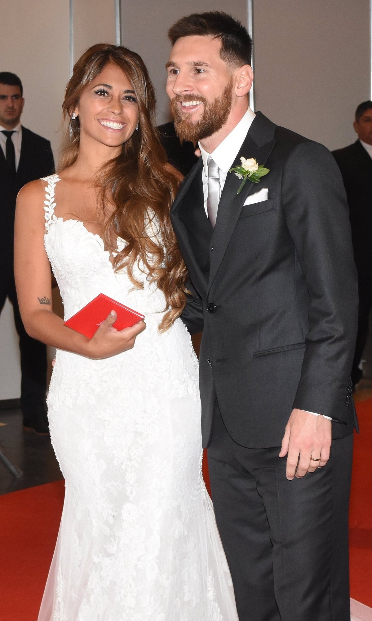 Lionel Messi and Antonela Roccuzzo greet the press after their civil wedding ceremony at the City Center Rosario Hotel & Casino