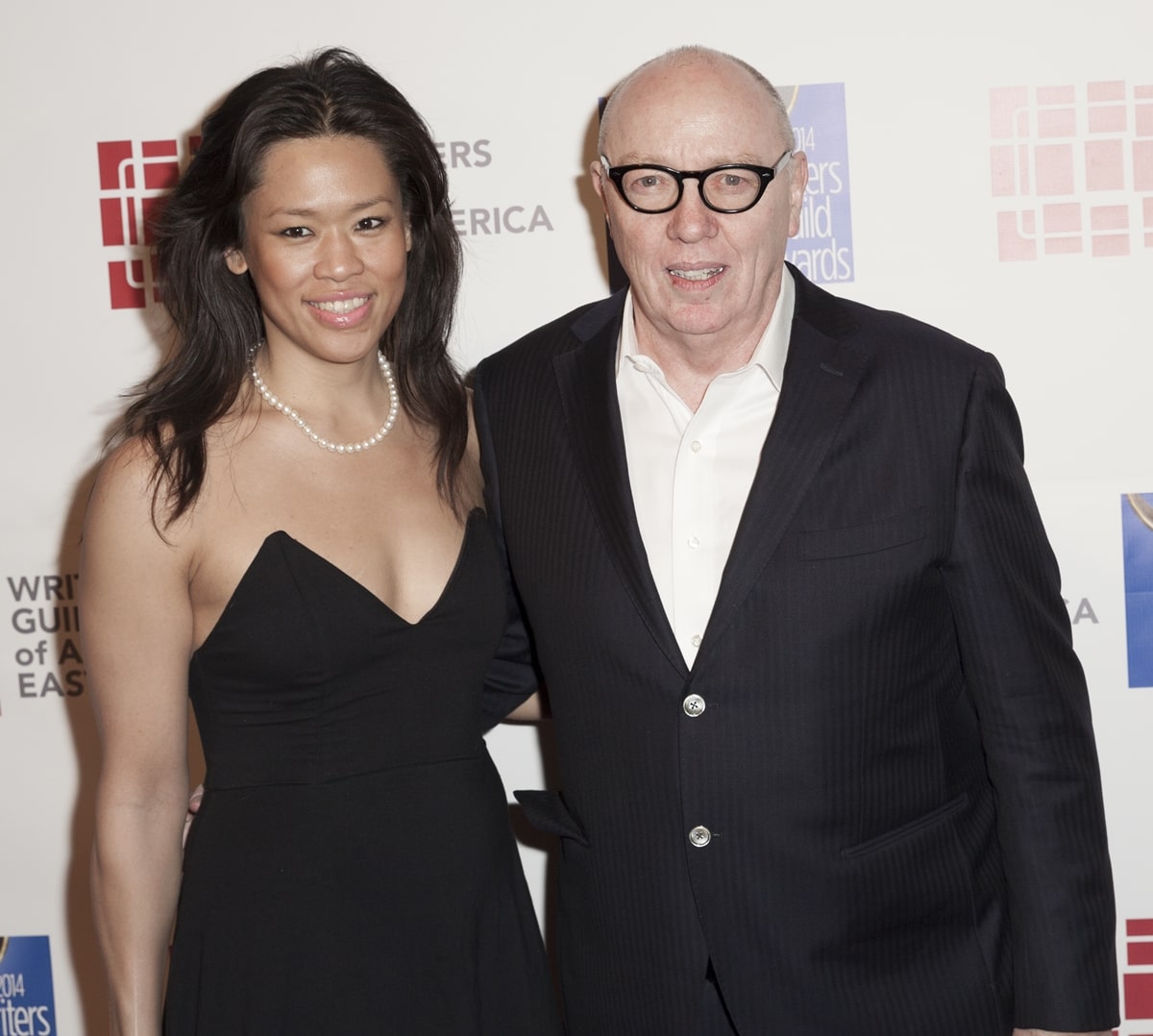 Writer Terry George (R) and Tiffany Chen attend the 66th Annual Writers Guild Awards East Coast Ceremony