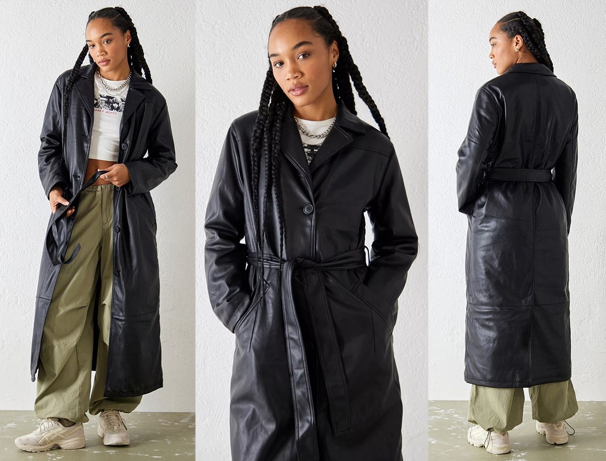 The Urban Outfitters Luna trench coat is a sleek belted trench coat in a faux leather fabrication with a revere collar, long sleeves, a single-breasted button placket, side pockets, and a maxi length hem