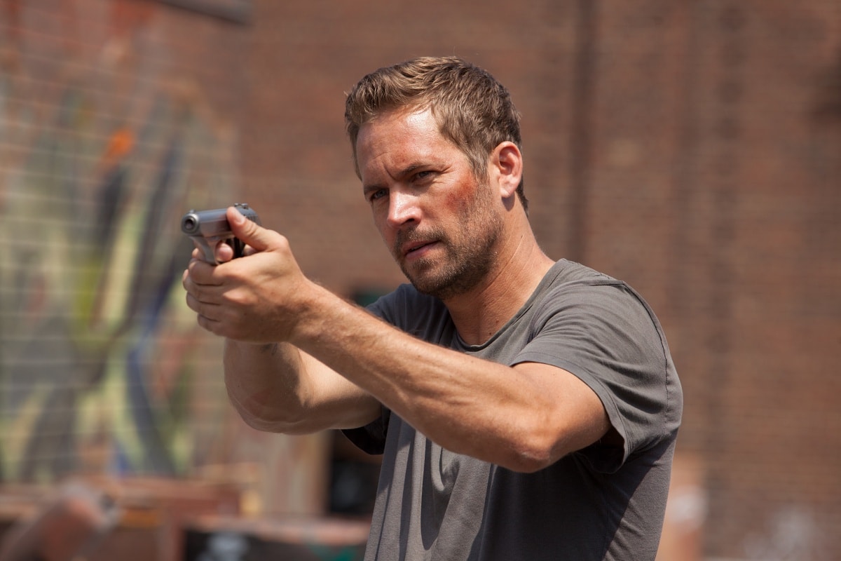 Paul Walker showcased his action prowess as Damien Collier in the 2014 film "Brick Mansions," delivering an engaging performance as a determined law enforcement officer navigating a dangerous urban environment to take down a notorious crime lord